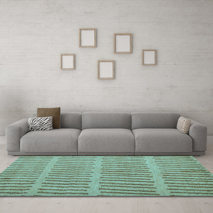 Machine Washable Solid Light Blue Modern Rug in a Living Room, wshabs5440lblu