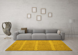 Machine Washable Solid Yellow Modern Rug in a Living Room, wshabs5440yw