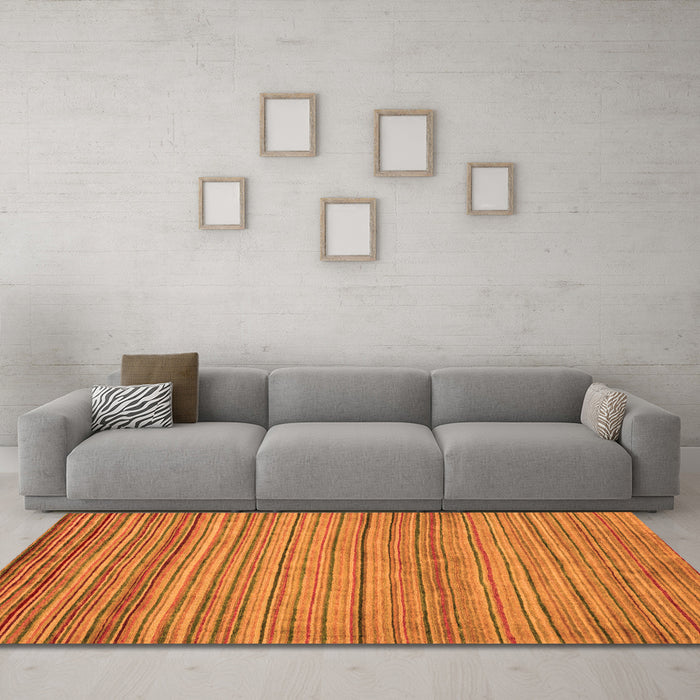 Machine Washable Abstract Orange Modern Area Rugs in a Living Room, wshabs5451org