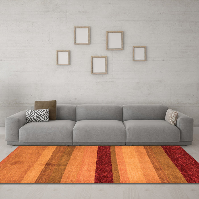 Machine Washable Abstract Orange Modern Area Rugs in a Living Room, wshabs5454org
