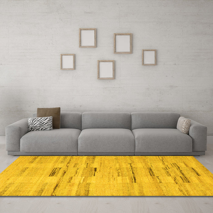 Machine Washable Solid Yellow Modern Rug in a Living Room, wshabs5469yw