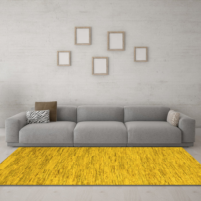 Machine Washable Solid Yellow Modern Rug in a Living Room, wshabs5471yw