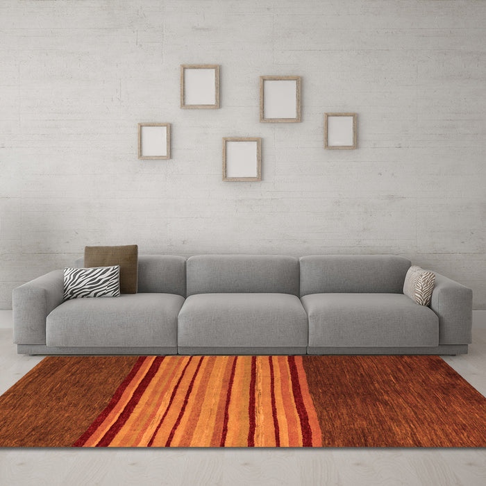 Machine Washable Abstract Orange Modern Area Rugs in a Living Room, wshabs5481org