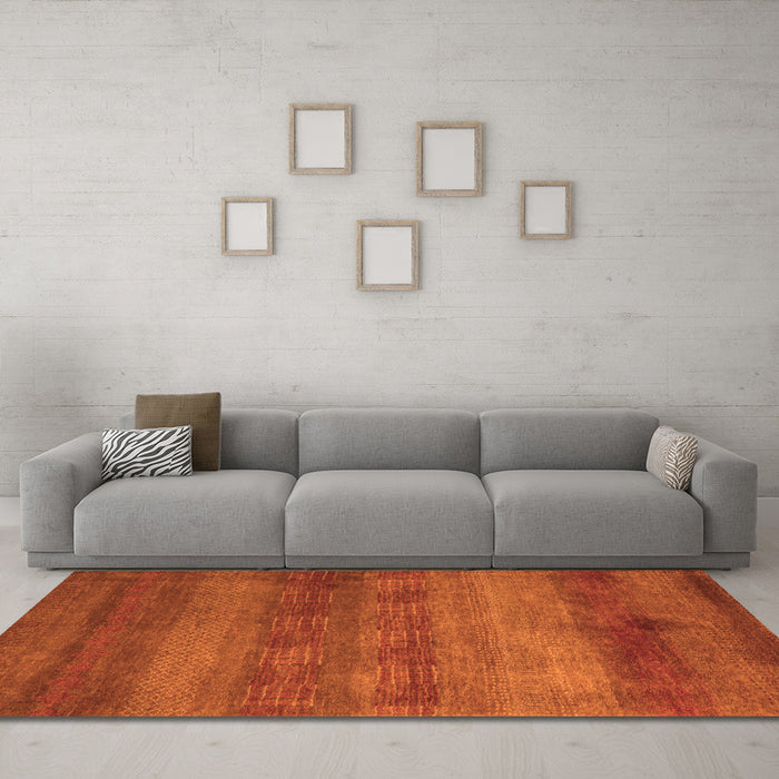 Machine Washable Abstract Orange Modern Area Rugs in a Living Room, wshabs5496org