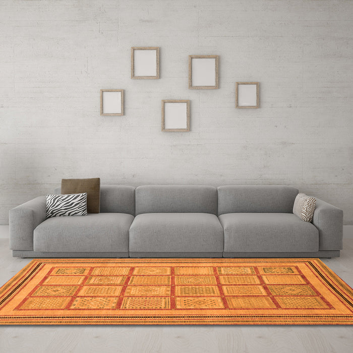 Machine Washable Abstract Orange Modern Area Rugs in a Living Room, wshabs54org