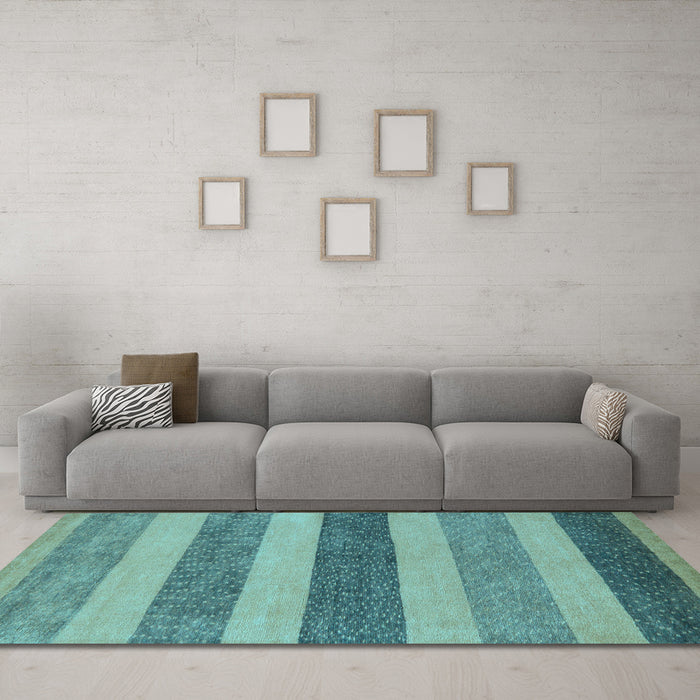 Machine Washable Oriental Light Blue Modern Rug in a Living Room, wshabs5514lblu