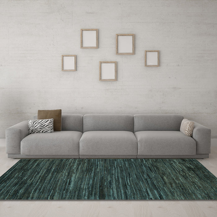 Machine Washable Oriental Light Blue Modern Rug in a Living Room, wshabs5516lblu