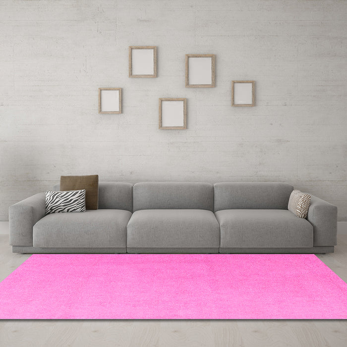 Machine Washable Solid Pink Modern Rug in a Living Room, wshabs5530pnk