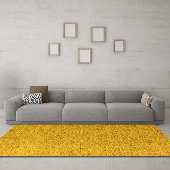 Machine Washable Solid Yellow Modern Rug in a Living Room, wshabs5553yw