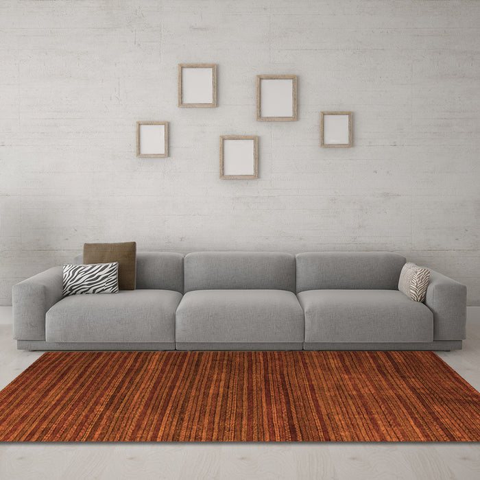 Machine Washable Abstract Orange Modern Area Rugs in a Living Room, wshabs5558org