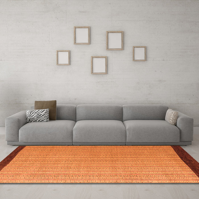 Machine Washable Abstract Orange Modern Area Rugs in a Living Room, wshabs5563org
