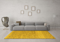Machine Washable Solid Yellow Modern Rug in a Living Room, wshabs5576yw