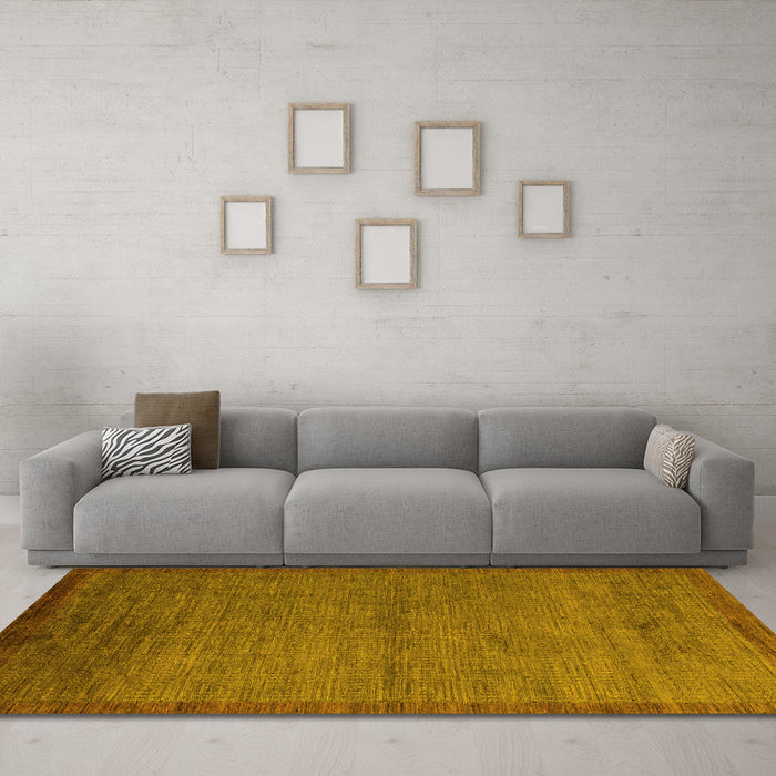 Machine Washable Abstract Yellow Modern Rug in a Living Room, wshabs5580yw