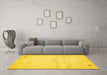 Machine Washable Solid Yellow Modern Rug in a Living Room, wshabs5591yw