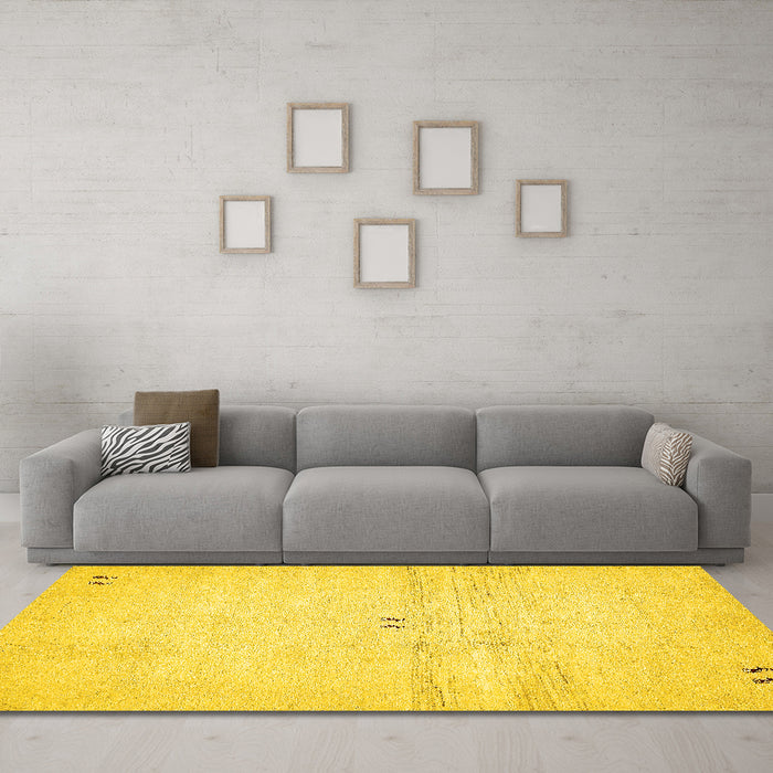Machine Washable Solid Yellow Modern Rug in a Living Room, wshabs5591yw