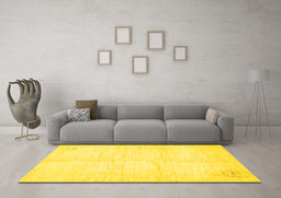 Machine Washable Solid Yellow Modern Rug in a Living Room, wshabs5594yw