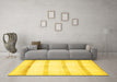 Machine Washable Solid Yellow Modern Rug in a Living Room, wshabs5595yw