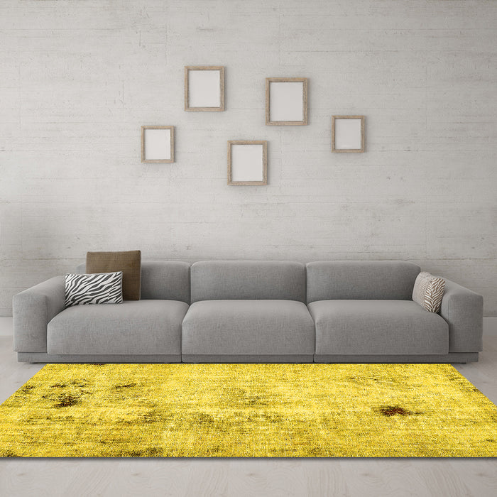 Machine Washable Solid Yellow Modern Rug in a Living Room, wshabs5605yw