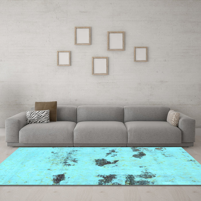 Machine Washable Solid Light Blue Modern Rug in a Living Room, wshabs5610lblu