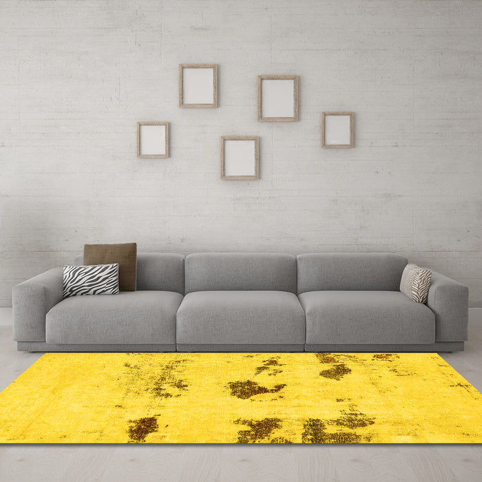 Machine Washable Solid Yellow Modern Rug in a Living Room, wshabs5610yw