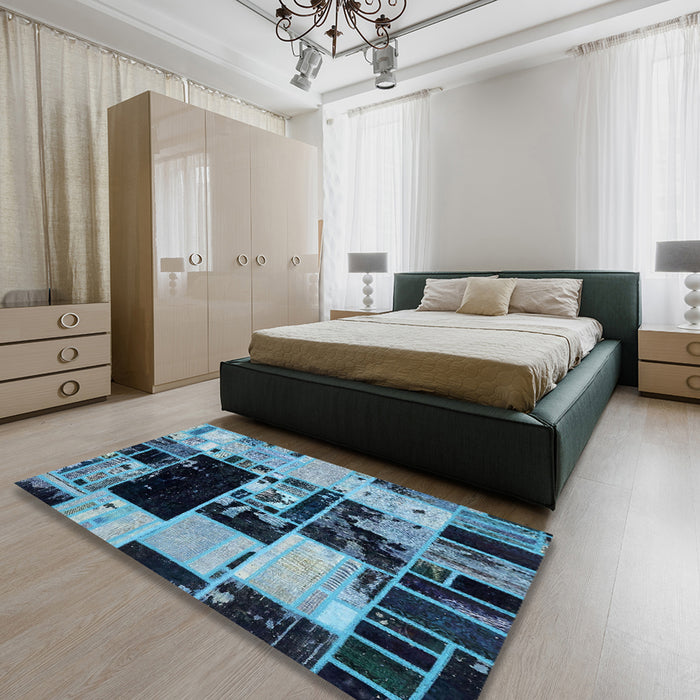 Abstract Deep-Sea Blue Patchwork Rug in a Bedroom, abs5625