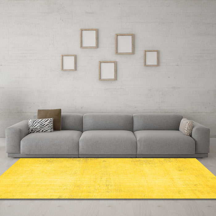 Machine Washable Solid Yellow Modern Rug in a Living Room, wshabs5636yw