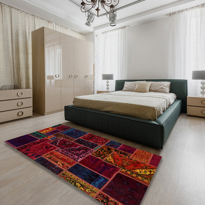 Abstract Red Patchwork Rug in a Bedroom, abs574