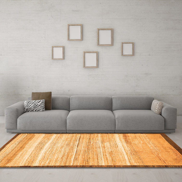 Machine Washable Abstract Orange Modern Area Rugs in a Living Room, wshabs57org