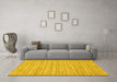 Machine Washable Solid Yellow Modern Rug in a Living Room, wshabs65yw