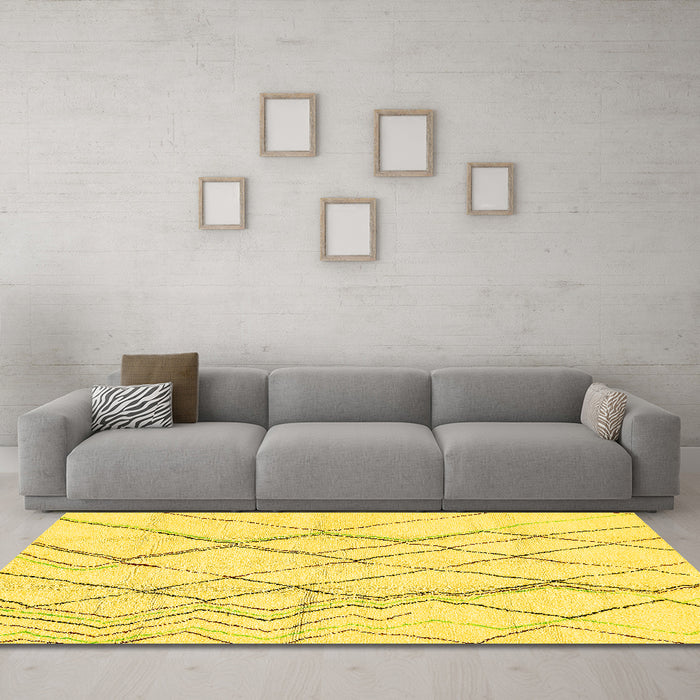 Machine Washable Solid Yellow Modern Rug in a Living Room, wshabs671yw