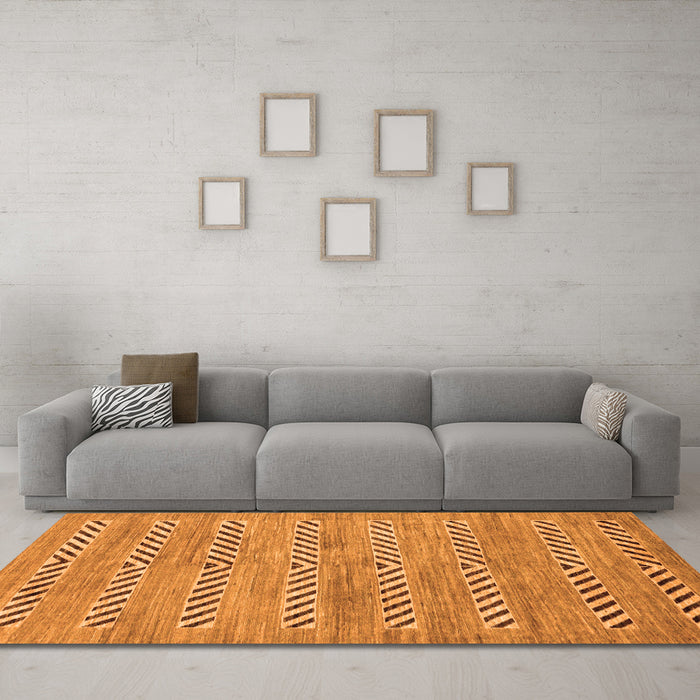 Machine Washable Abstract Orange Modern Area Rugs in a Living Room, wshabs69org