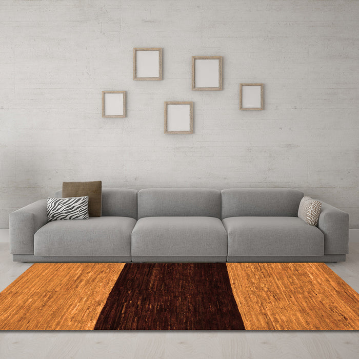 Machine Washable Abstract Orange Modern Area Rugs in a Living Room, wshabs77org