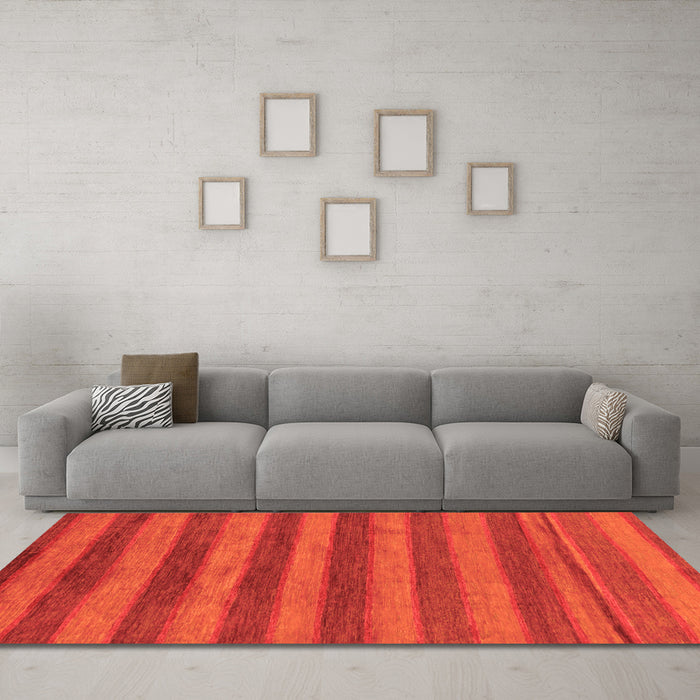 Machine Washable Abstract Orange Modern Area Rugs in a Living Room, wshabs7org