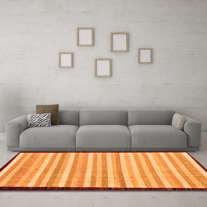 Machine Washable Abstract Orange Modern Area Rugs in a Living Room, wshabs90org