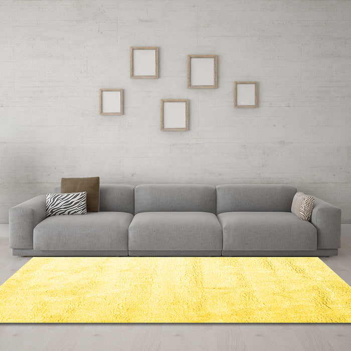 Machine Washable Solid Yellow Modern Rug in a Living Room, wshcon1011yw