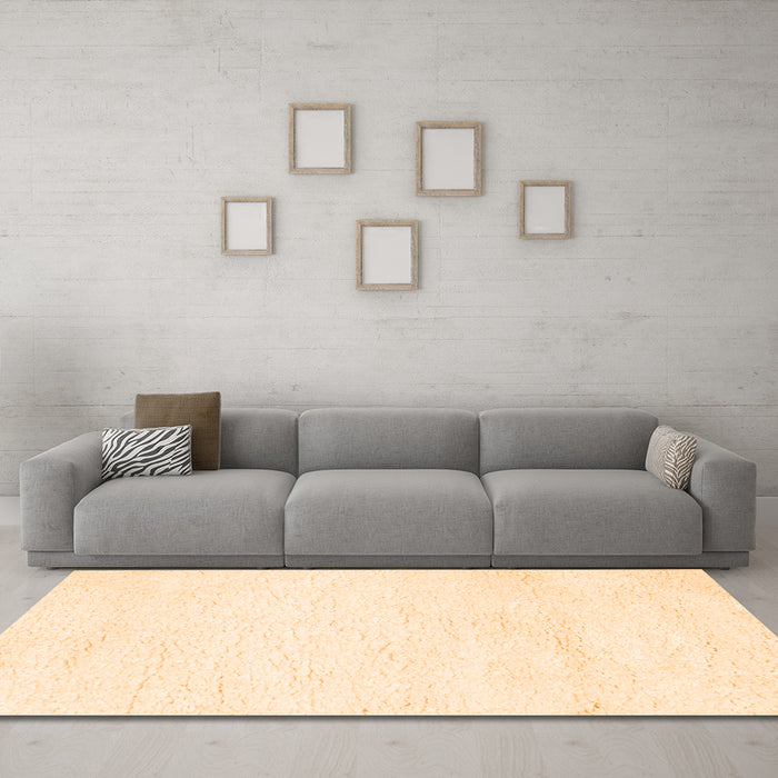 Machine Washable Solid Orange Modern Area Rugs in a Living Room, wshcon1025org