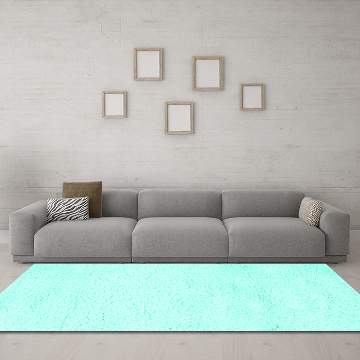 Machine Washable Solid Turquoise Modern Area Rugs in a Living Room,, wshcon1025turq