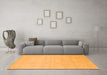 Machine Washable Solid Orange Modern Area Rugs in a Living Room, wshcon1026org