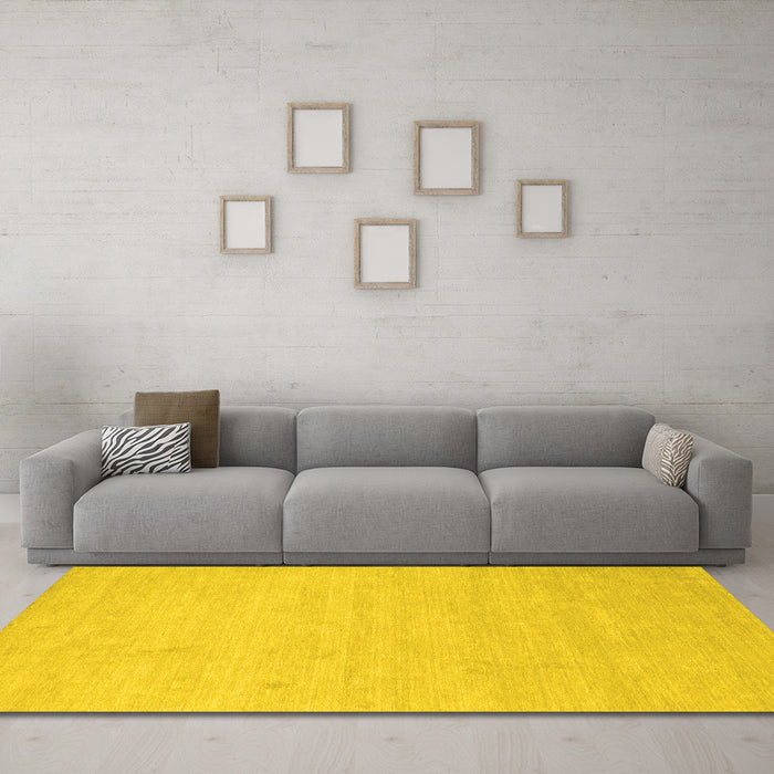 Machine Washable Solid Yellow Modern Rug in a Living Room, wshcon1026yw