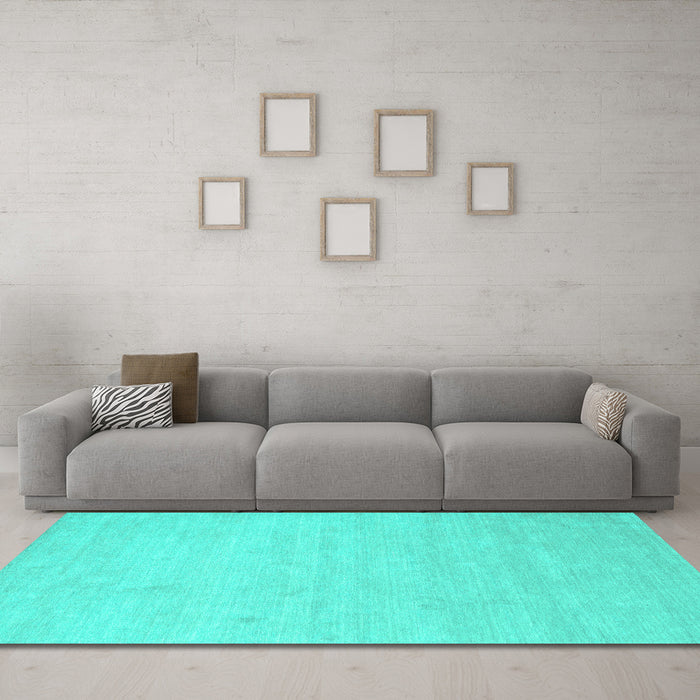Machine Washable Solid Turquoise Modern Area Rugs in a Living Room,, wshcon1026turq