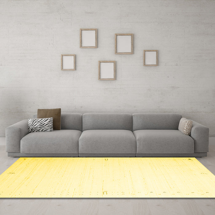Machine Washable Solid Yellow Modern Rug in a Living Room, wshcon1034yw