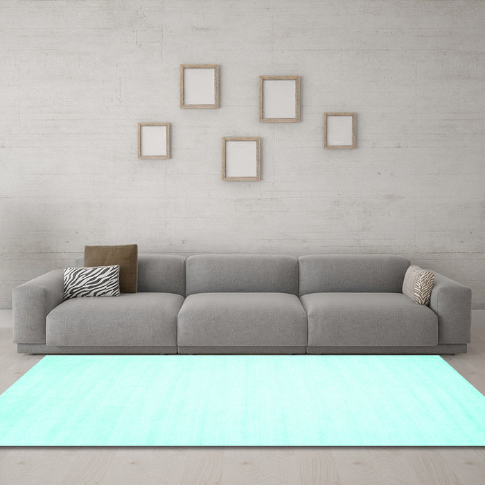 Machine Washable Solid Turquoise Modern Area Rugs in a Living Room,, wshcon103turq