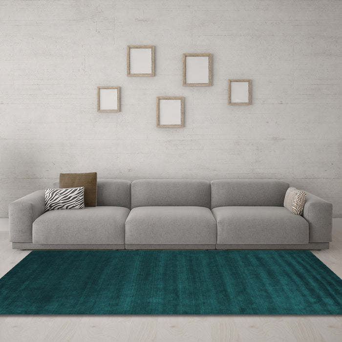 Machine Washable Abstract Turquoise Contemporary Area Rugs in a Living Room,, wshcon107turq
