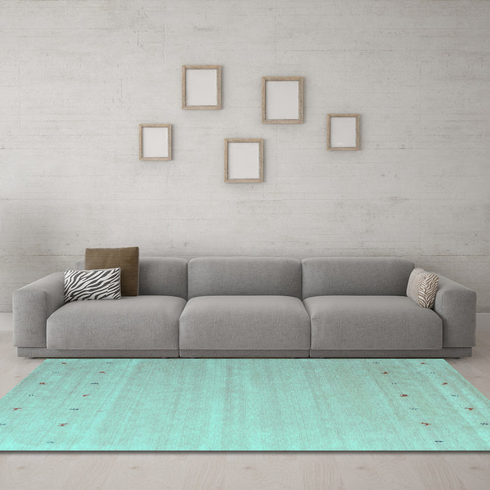 Machine Washable Abstract Turquoise Contemporary Area Rugs in a Living Room,, wshcon1087turq