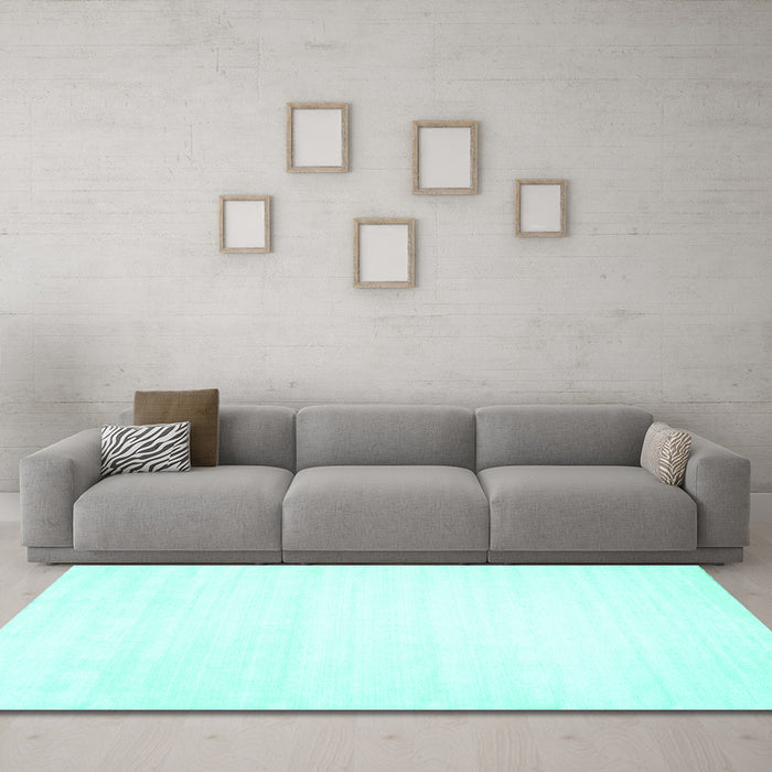Machine Washable Solid Turquoise Modern Area Rugs in a Living Room,, wshcon108turq