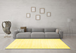 Machine Washable Solid Yellow Modern Rug in a Living Room, wshcon108yw
