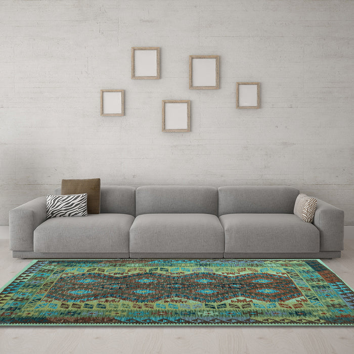 Machine Washable Oriental Light Blue Traditional Rug in a Living Room, wshcon1094lblu