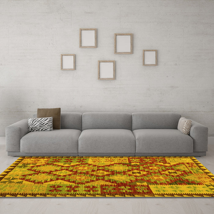 Machine Washable Oriental Yellow Traditional Rug in a Living Room, wshcon1100yw