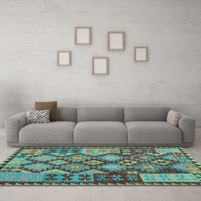 Machine Washable Oriental Light Blue Traditional Rug in a Living Room, wshcon1100lblu
