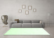 Machine Washable Solid Green Modern Area Rugs in a Living Room,, wshcon1104grn